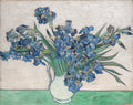 Vincent van Gogh, Irises, 1890 — a bouquet of violet irises in a vase against a pale pink-yellow background